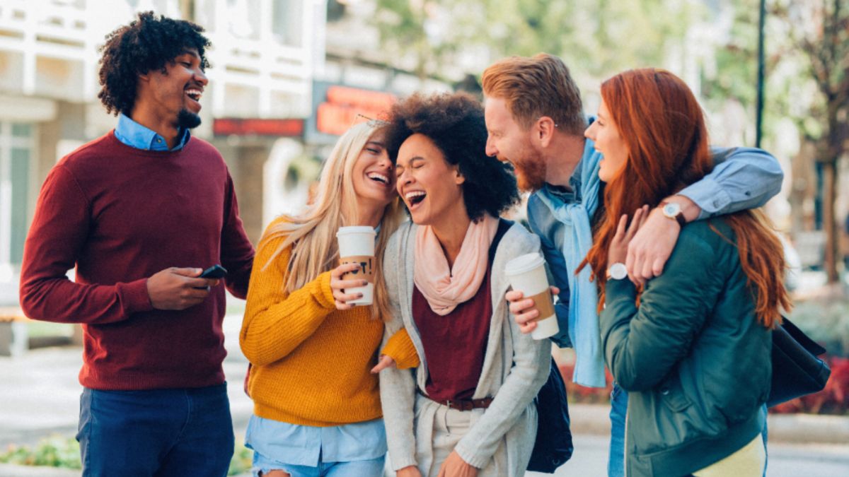 A group of friends joyfully enjoying the city, symbolizing support, community, and meaningful relationships.